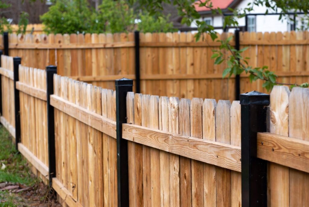 4. Cedar Fence with Black Posts