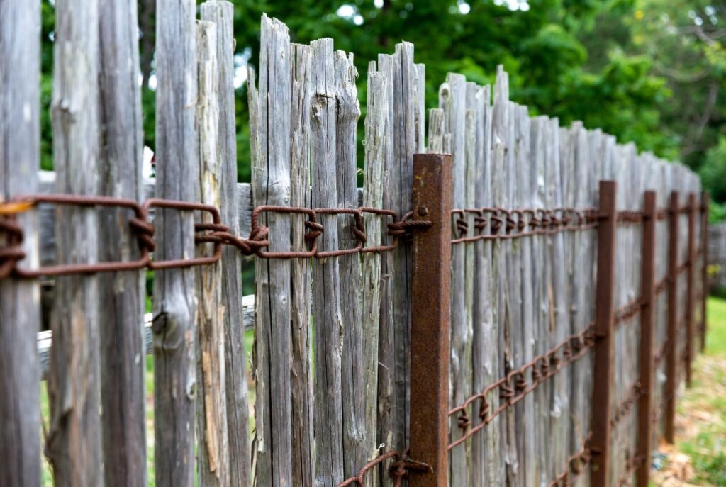 9. Wood and Metal Hybrid Fence
