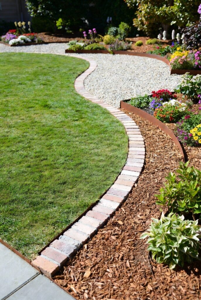 <img data-src="expensive-garden-edging.jpg" alt="Edging tricks that make a garden look expensive - Professional garden edging ideas using brick, stone, metal, and wood borders that create clean crisp lines and premium landscape design. Beautiful raised garden beds with elegant edging separating lawn from flower beds and pathways. Budget-friendly DIY edging techniques that instantly upgrade backyard gardens to look luxurious and high-end. Discover the best garden edging tricks for neat professional appearance, weed control, and defined spaces that make any garden look like a million dollars.">