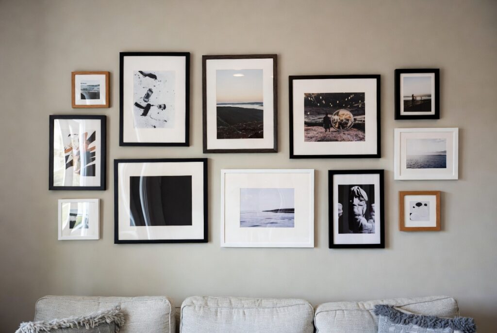 <img data-src="gallery-wall-spacing.jpg" alt="The gallery wall spacing secret most people get wrong - Professional interior design technique for perfectly spaced gallery wall arrangement that looks expensive and intentional. Beautiful living room gallery wall with framed art photos and prints properly spaced using the correct measurements and visual balance. How wrong gallery wall spacing makes walls look messy and cheap while the right spacing creates a polished high-end look. Expert tips on gallery wall layout spacing rules for stunning salon style walls that elevate any room instantly.">
