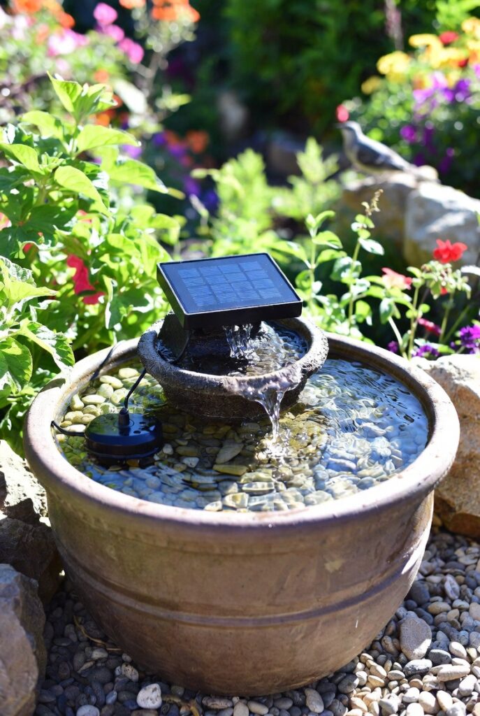 <img data-src="no-plumber-water-feature.jpg" alt="The water feature that requires no plumber - Easy DIY no-plumbing water features for gardens. Beautiful self-contained solar powered fountain, bubbling pot water feature and recirculating tabletop fountain in a peaceful backyard garden. Low maintenance water elements using solar pumps and containers that need no pipes or professional installation. Transform your garden with affordable easy water features perfect for beginners. Best no plumber garden water ideas for relaxation and wildlife attraction.">