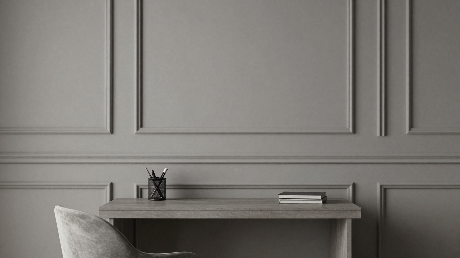 Home office wall with geometric trim molding pattern in monochromatic design