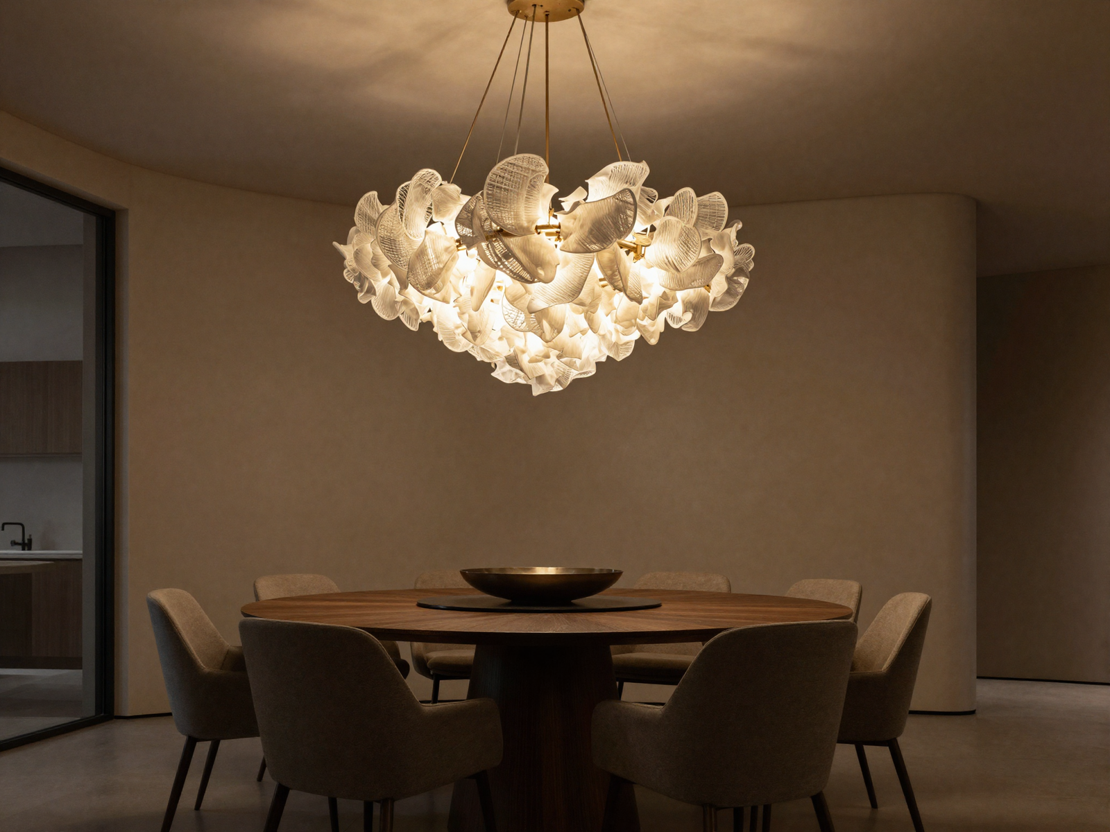 Dining room with sculptural statement chandelier over the table
