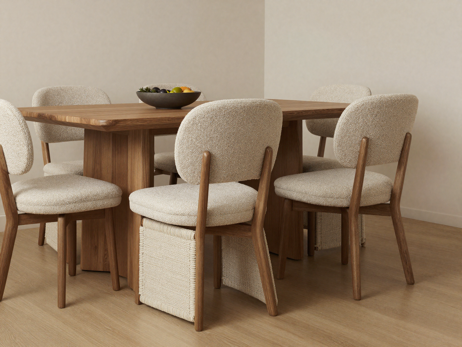 Dining room with textured woven and boucle chairs