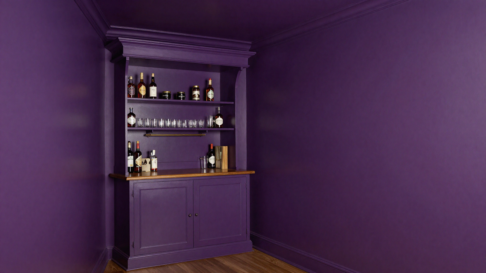 Small home bar nook color-drenched in deep eggplant purple with matching walls and ceiling