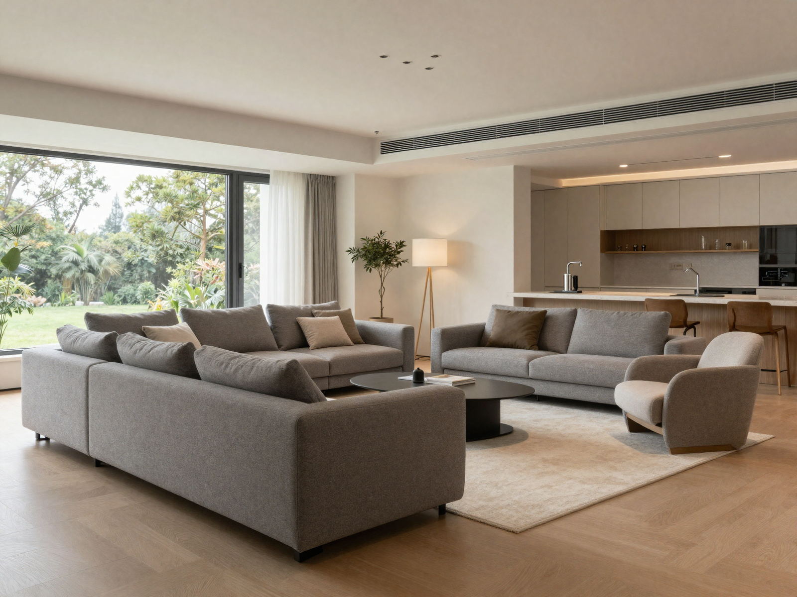 Living room with a main sofa cluster and a separate reading chair zone
