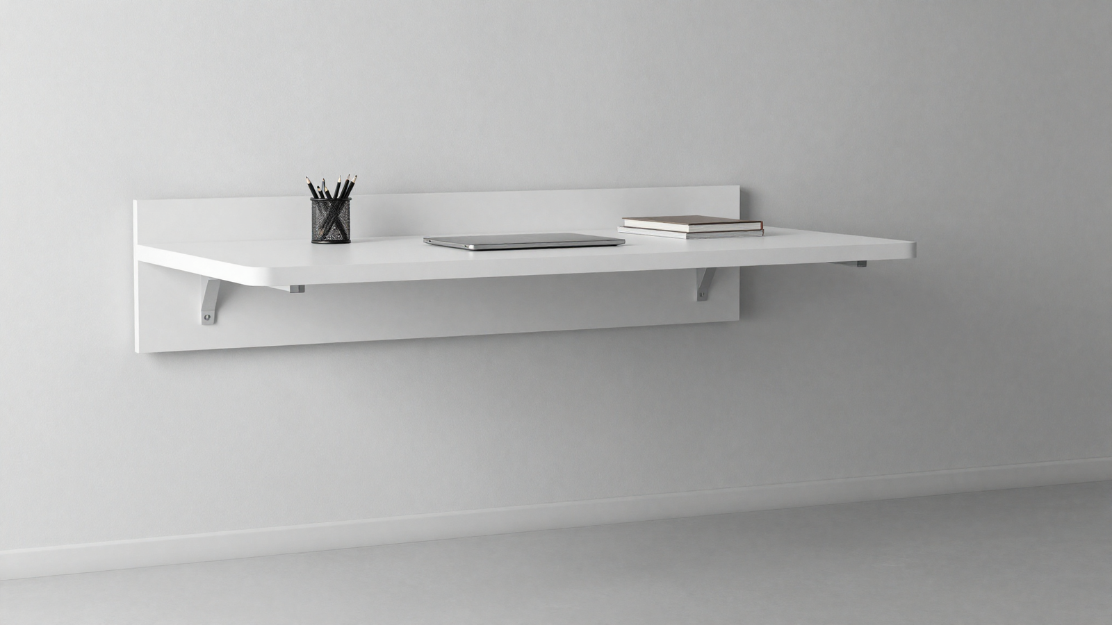 Small home office with white wall-mounted floating desk and completely clear floor