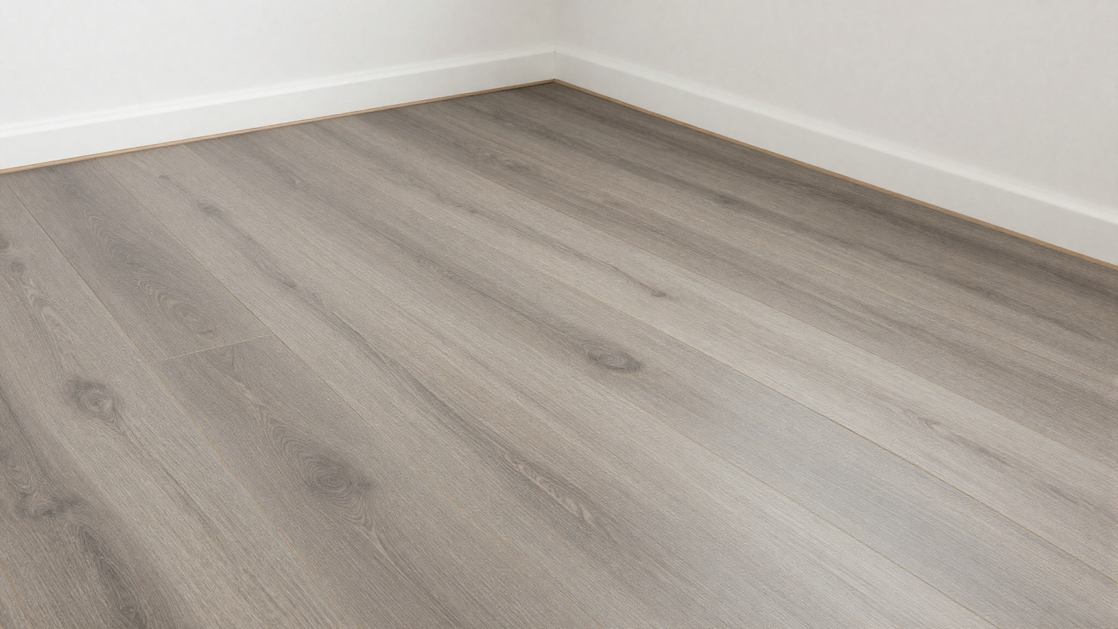 Basement with waterproof wood-look luxury vinyl plank flooring in gray-brown tone
