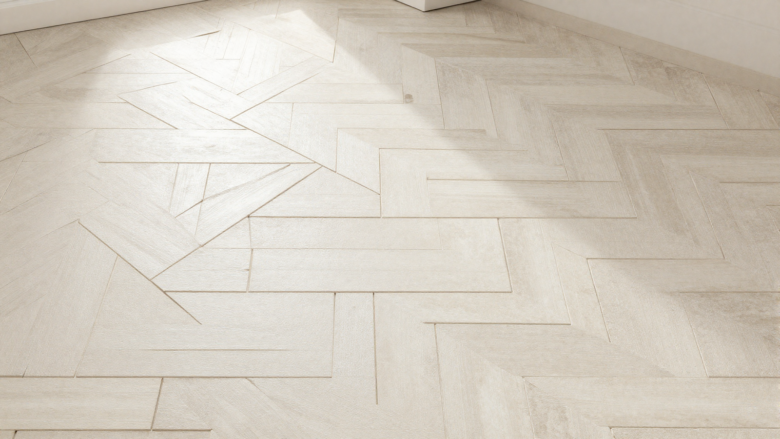 Bathroom floor with slim herringbone brick tile pattern in neutral cream tone