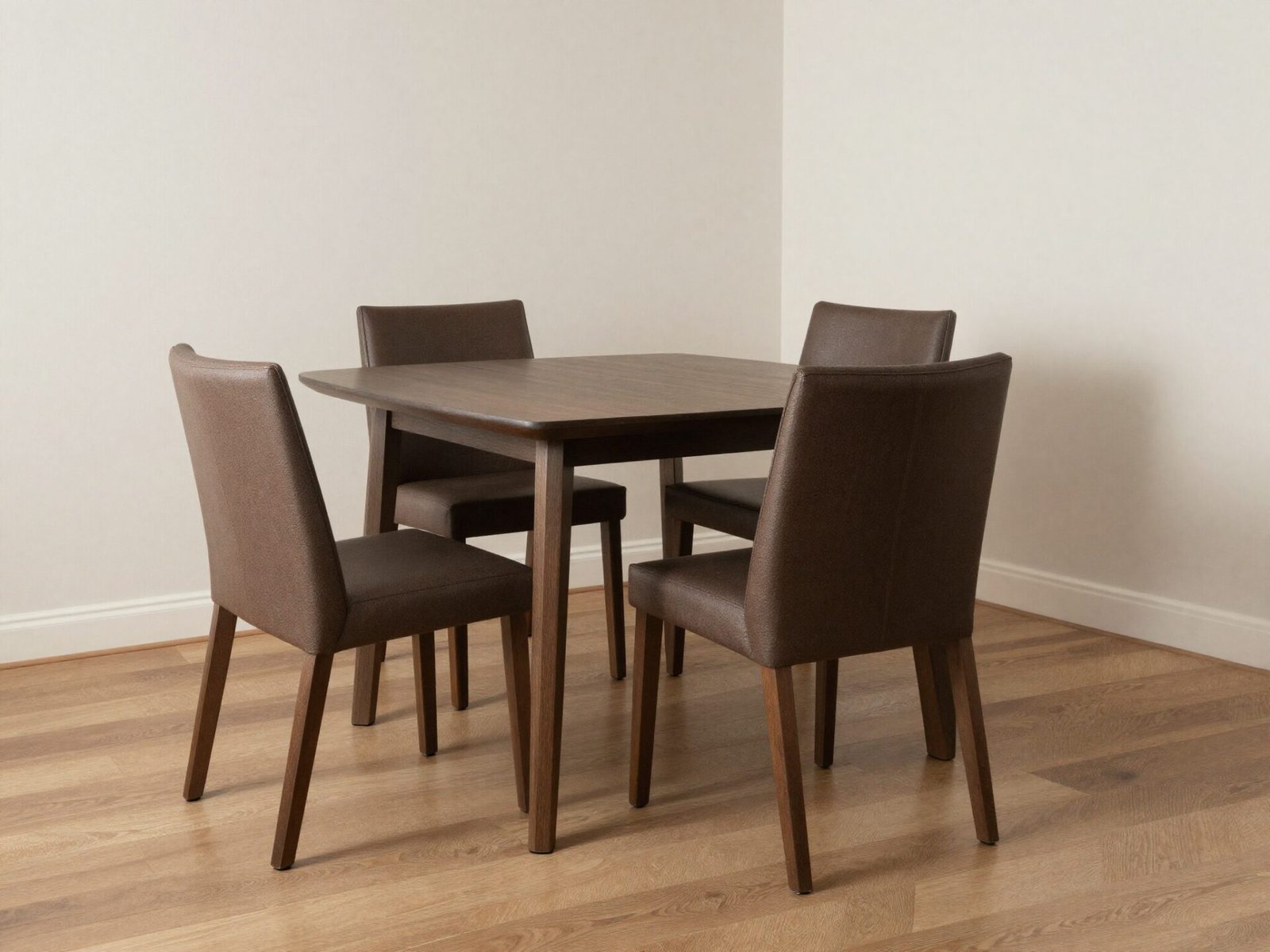 Dining table with chairs pulled out and visible walking space to the surrounding walls