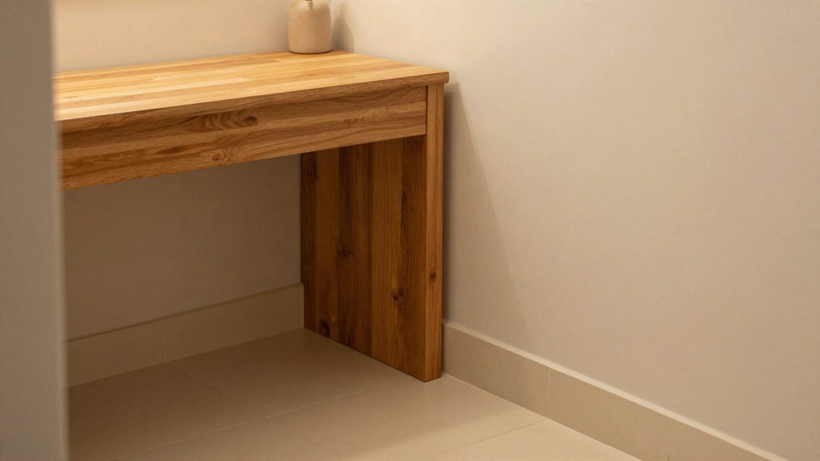 Warm, cozy small office nook inside a tiled bathroom with underfloor radiant heating.