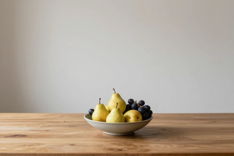Edible pear and grape centerpiece arranged in a low bowl