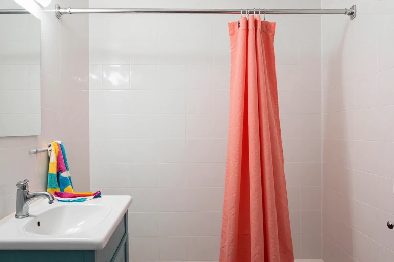 Colorful bathroom accents selected for easy cleaning